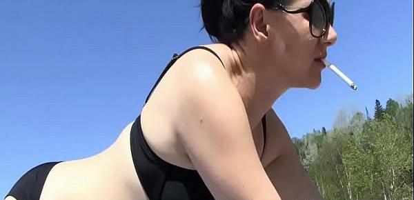  Nasty hot brunette slut posing in bikini